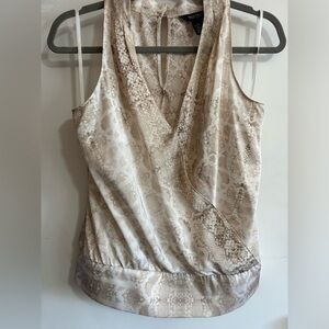 Silky animal print sleeveless blouse
